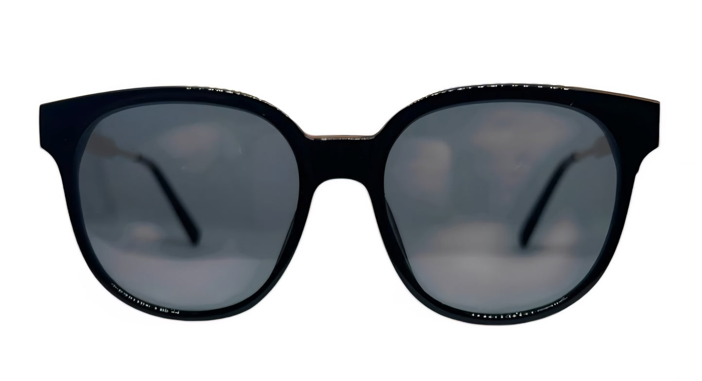 EK-9048 – Lentes de Sol Redondos de Policarbonato Negro con Patas Metálicas Doradas y Mica Oscura